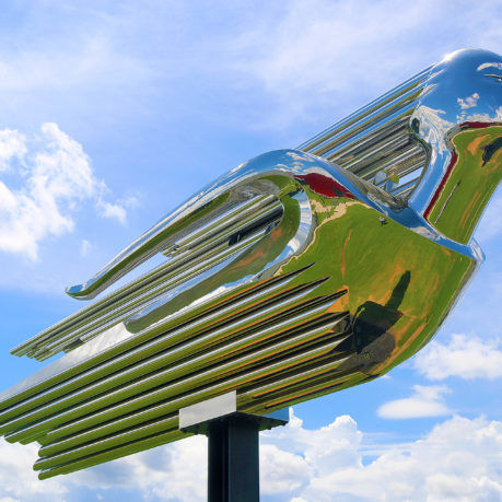 a metal sculpture of a bird
