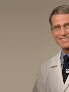 a man in a white coat