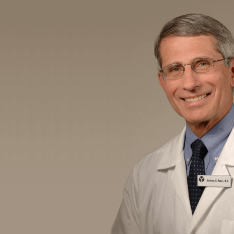 a man in a white coat