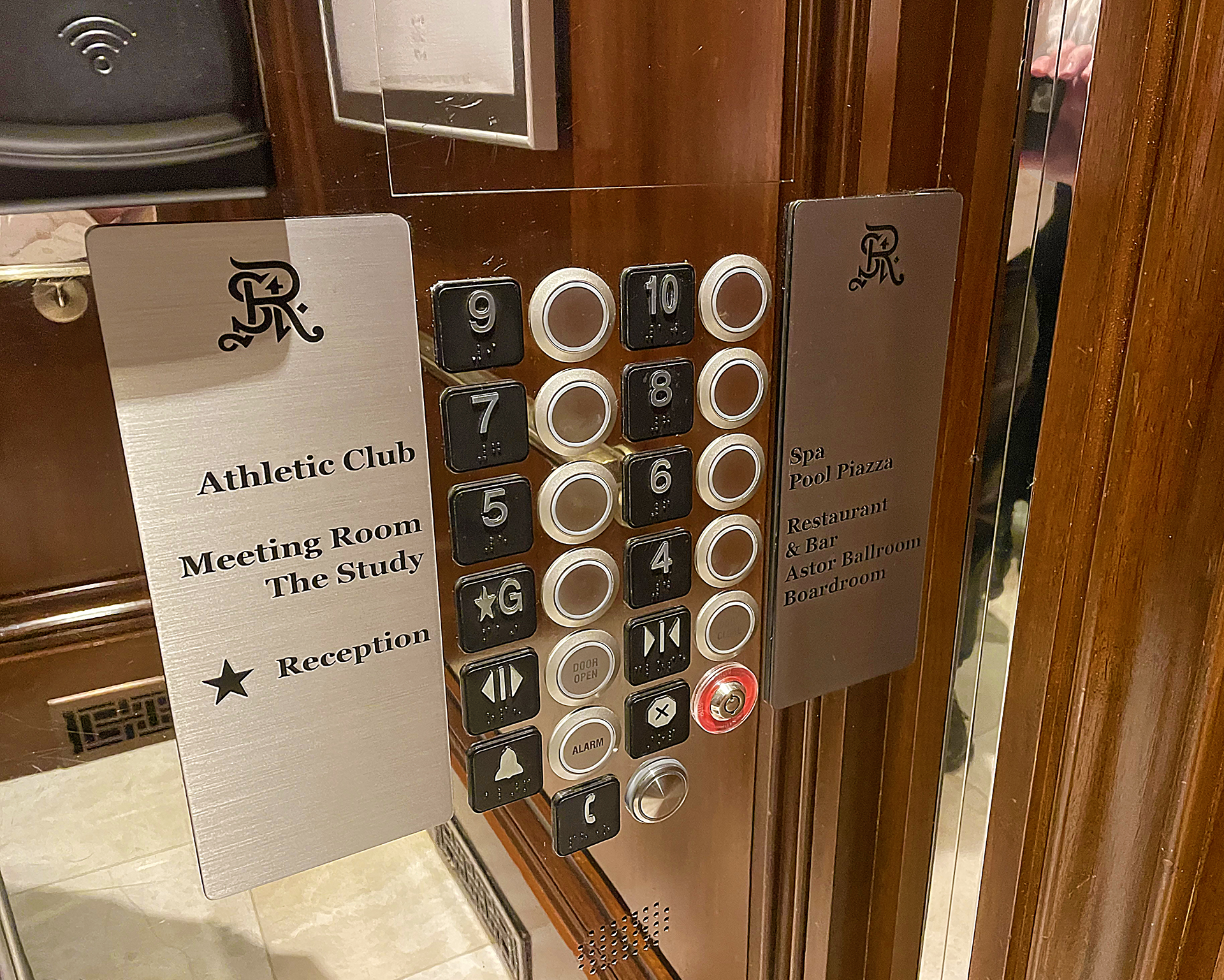 a elevator buttons and signs