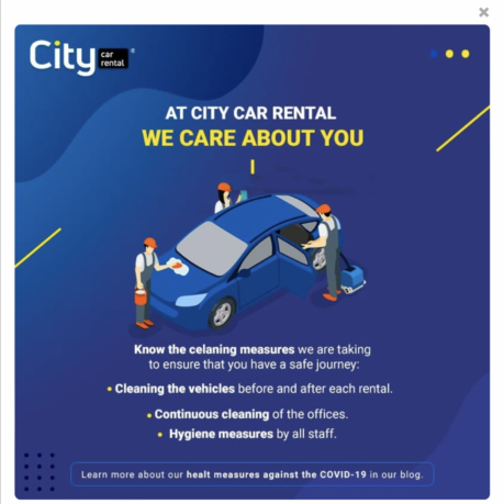 a blue advertisement with people cleaning a car