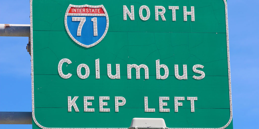 Button copy highway sign