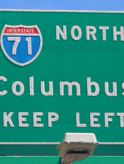 Button copy highway sign