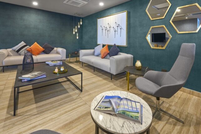 City Express Plus — lobby seating area