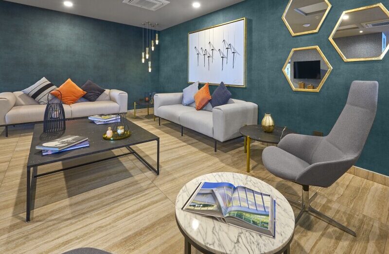 City Express Plus — lobby seating area