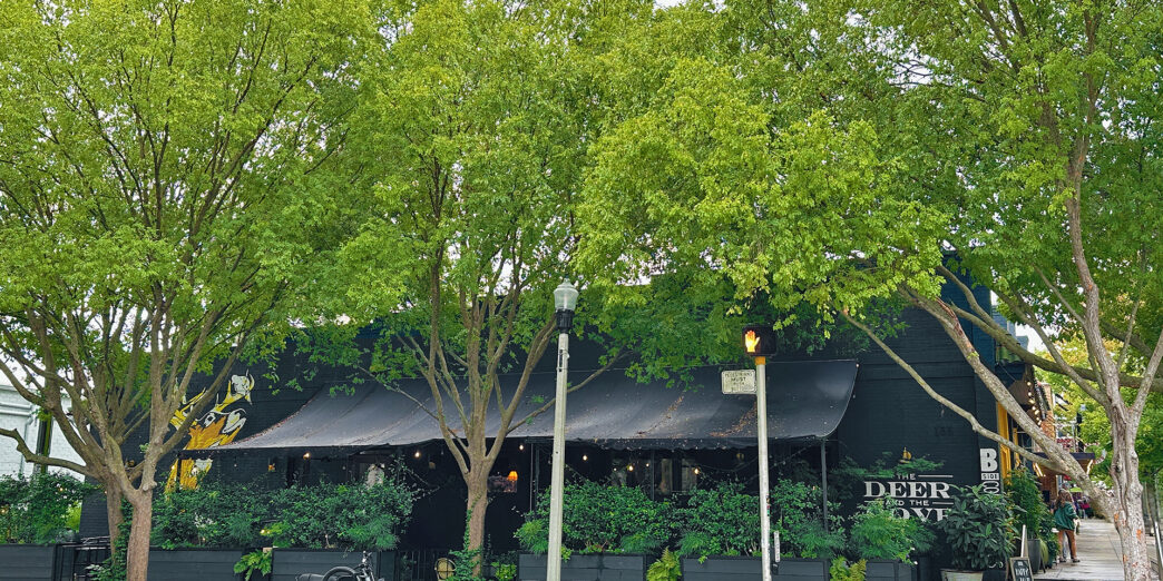 a building with trees in front of it