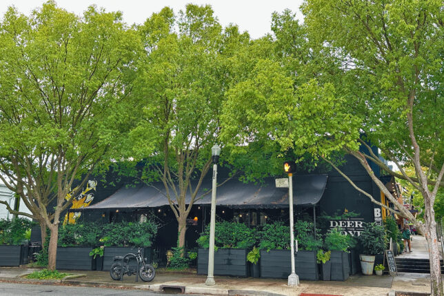 a building with trees in front of it