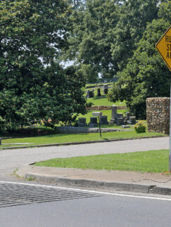 a yellow sign on a pole