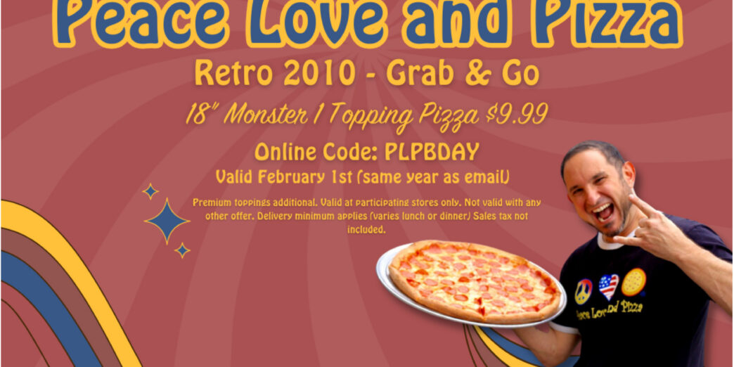 a man holding a pizza