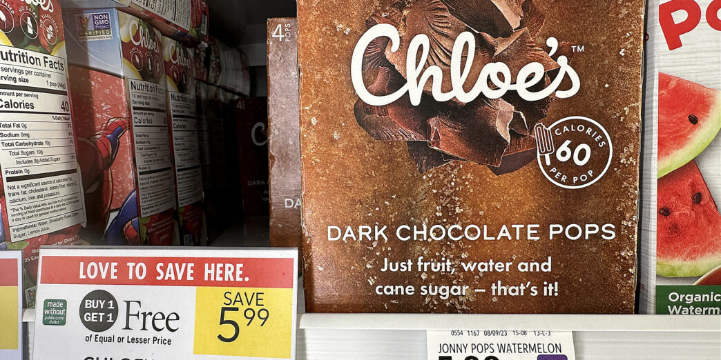 a box of chocolate pops on a shelf