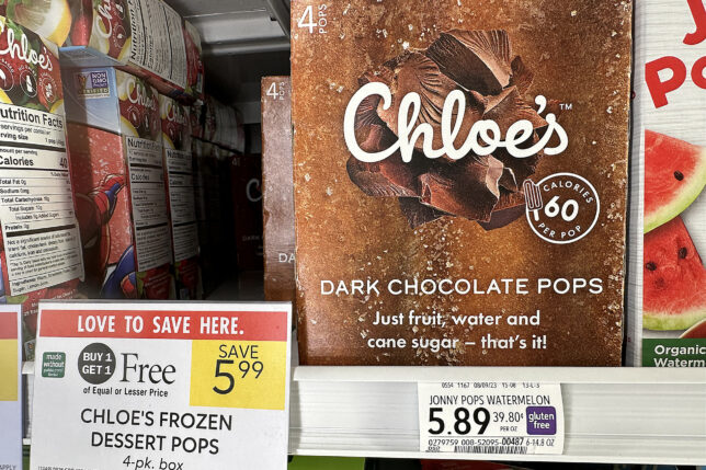 a box of chocolate pops on a shelf