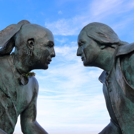 a statue of two men