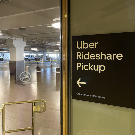 a sign on a glass door