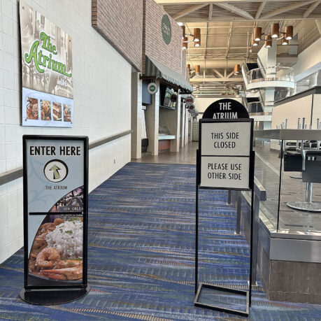 signs in a hallway of a building