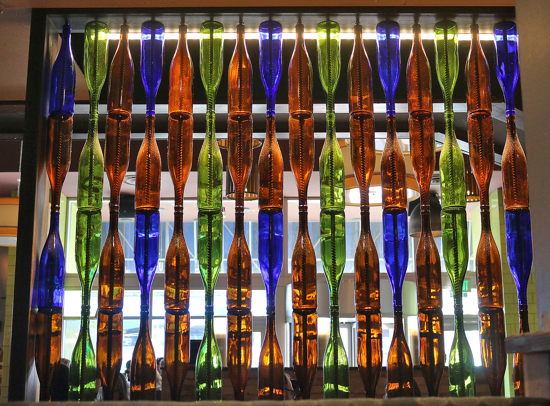 a row of colorful bottles