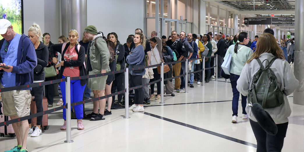 a line of people in a building