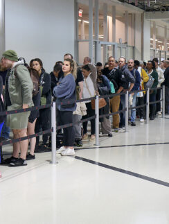 a line of people in a building