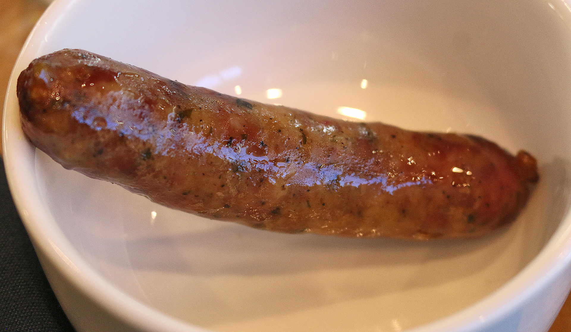a sausage in a bowl