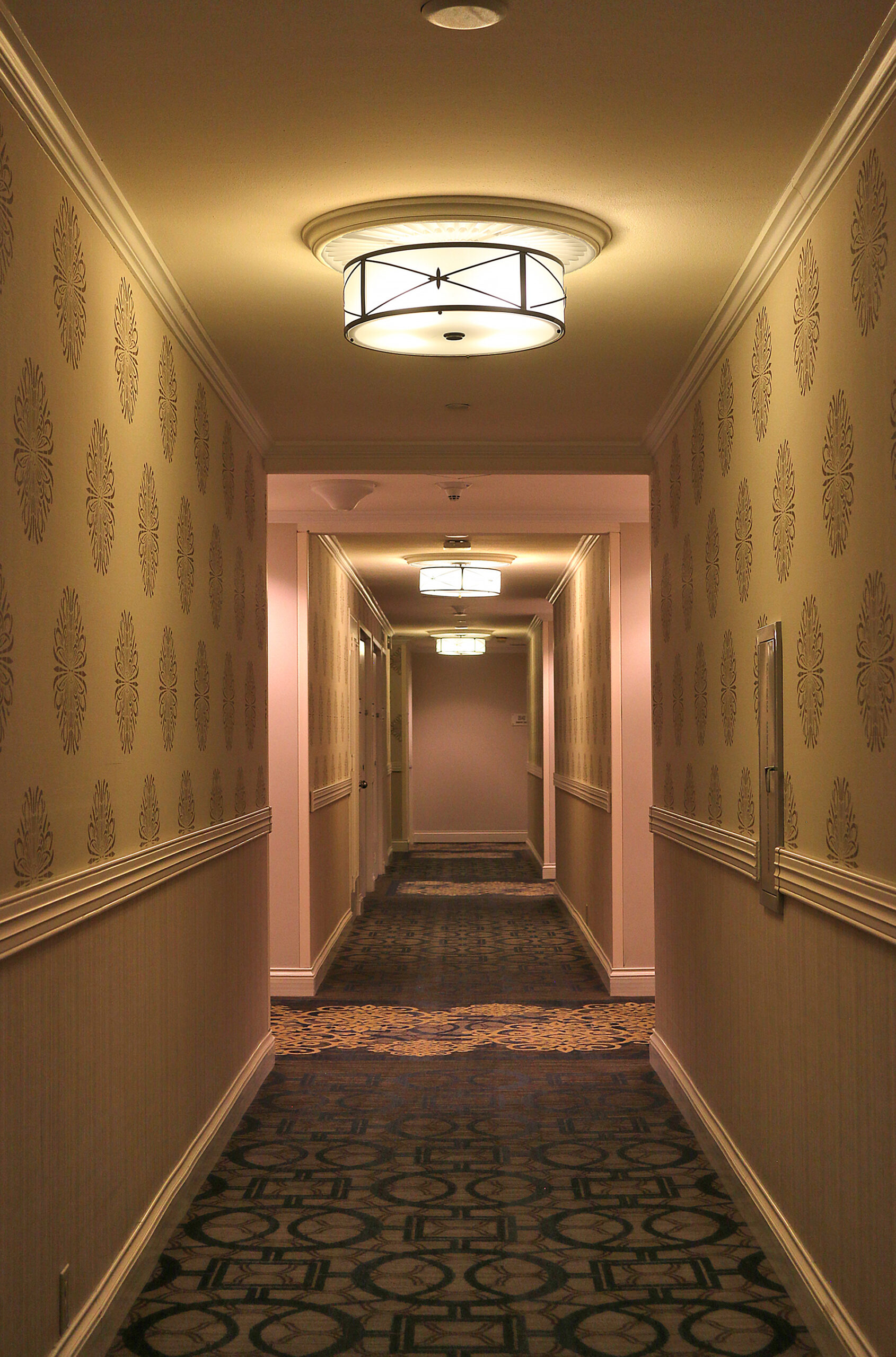 a hallway with a light fixture