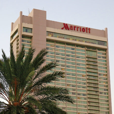 a building with a palm tree