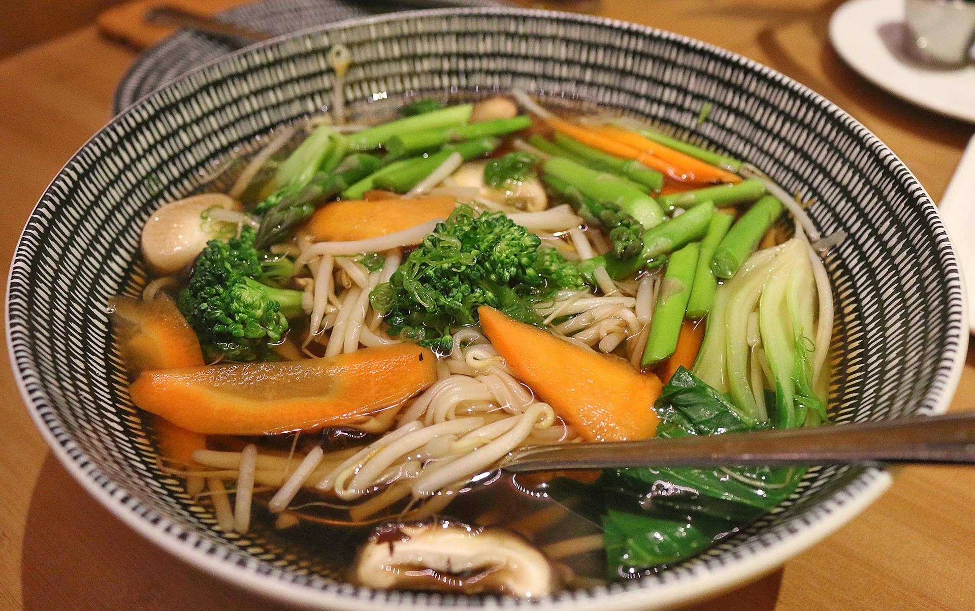 a bowl of soup with vegetables