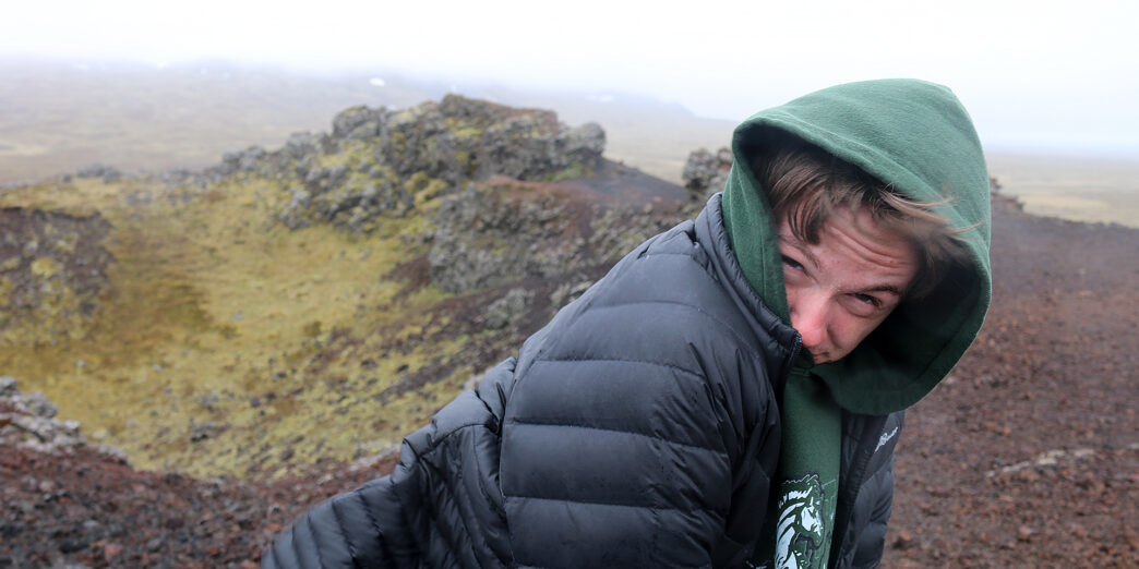 a man in a black coat