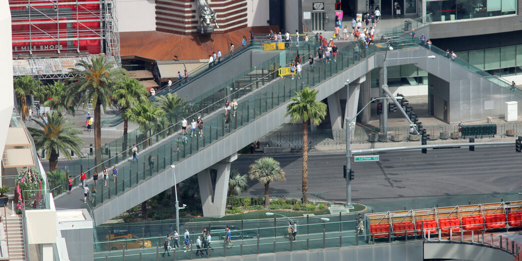 a group of people on a walkway