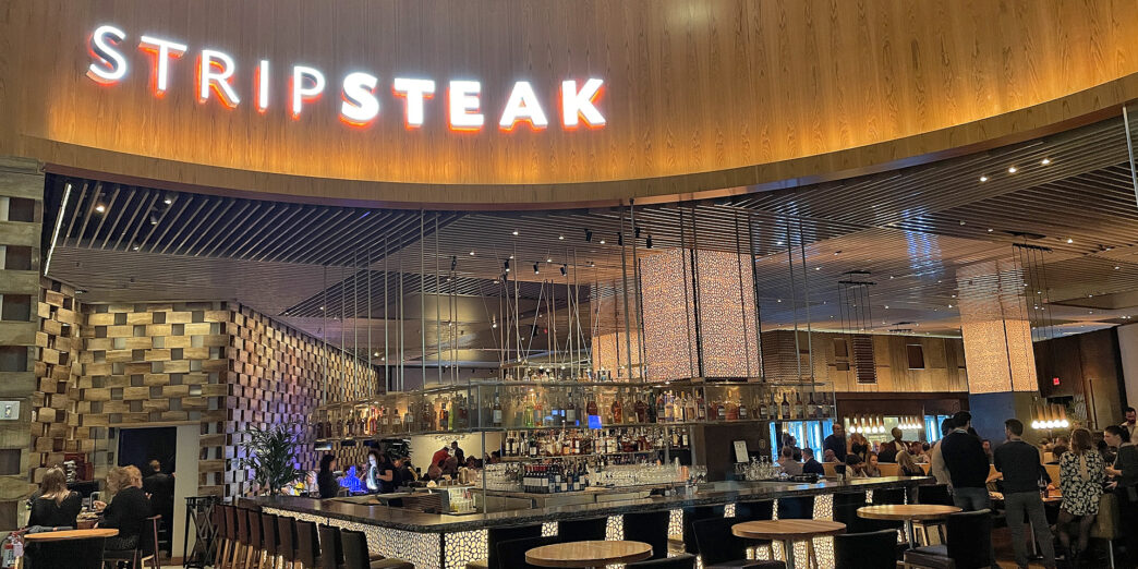 a restaurant with tables and chairs