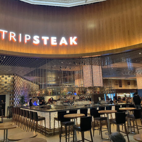 a restaurant with tables and chairs