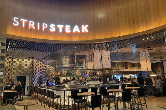 a restaurant with tables and chairs