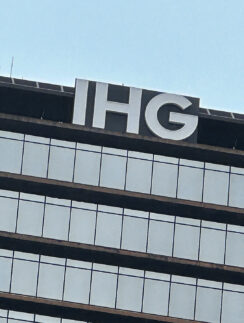 a building with a sign on top