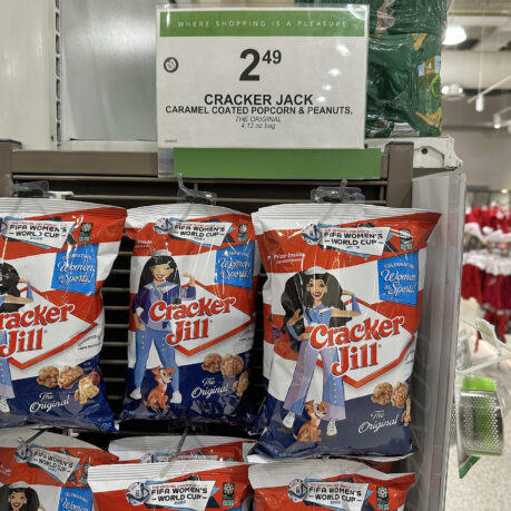 a group of bags of crackers on a shelf