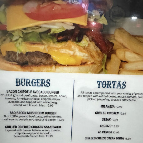 a menu of a burger and fries