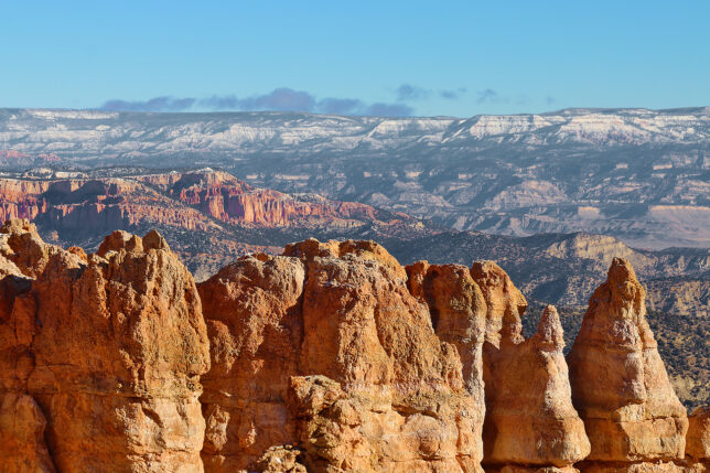 a rocky mountains with blue sky