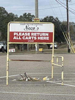 a sign in a parking lot