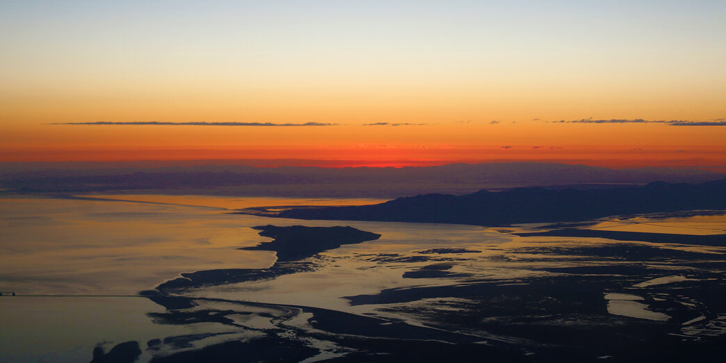 a sunset over a body of water