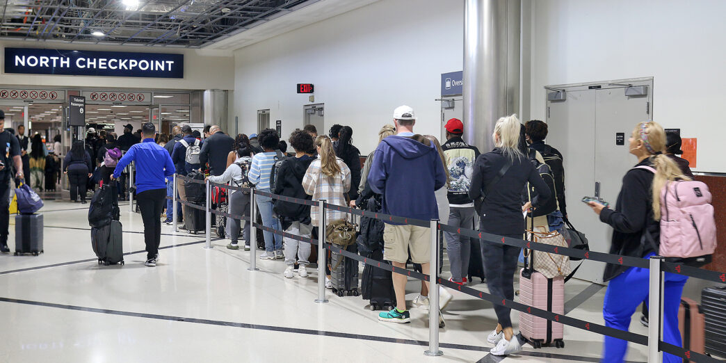a group of people standing in line