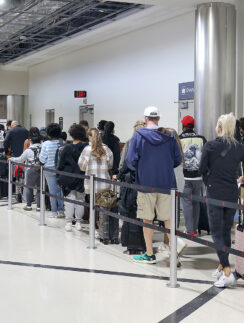 a group of people standing in line