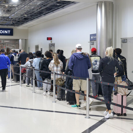 a group of people standing in line