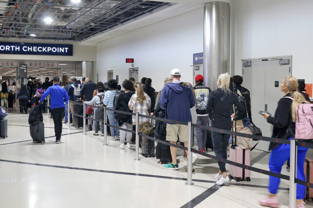 a group of people standing in line