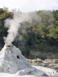 a mountain with a steam coming out of it