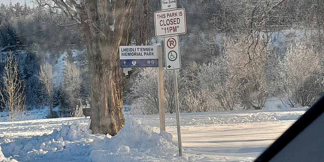 a sign post in the snow