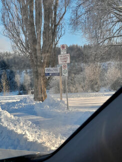 a sign post in the snow
