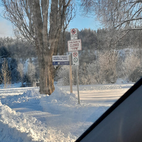 a sign post in the snow