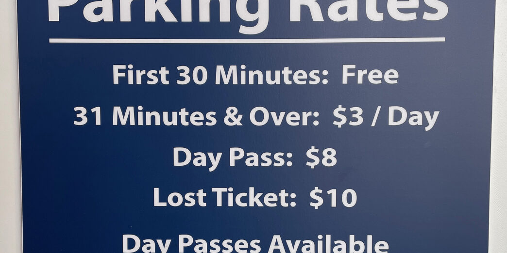 a blue sign with white text