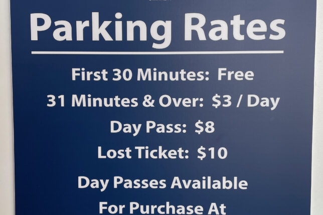 a blue sign with white text