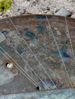 a circular object with lines and a screw