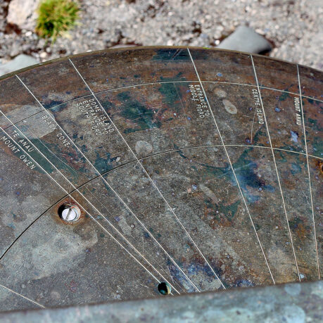 a circular object with lines and a screw