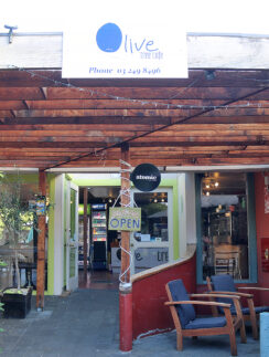 a restaurant with a sign