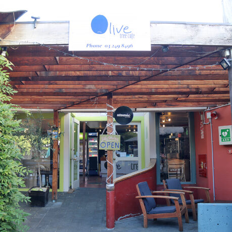 a restaurant with a sign